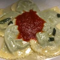 Ravioli · Ricotta and spinach filled ravioli, butter, sage and tomato sauce