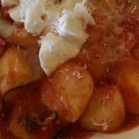 Gnocchi · Potato gnocchi, tomato sauce,  fresh mozzarella