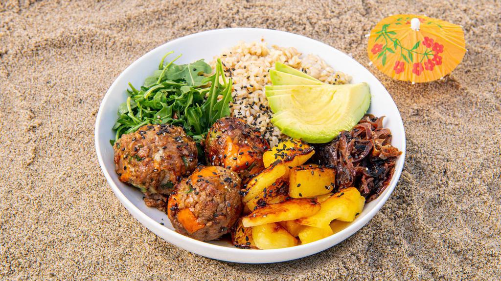 Hawaiian Meatball Bowl · Homemade Impossible meatballs in Lulu's Teriyaki Sauce, chili-dusted pineapple, peppers & onions, fresh arugula, green onions, lemon, sesame seeds, and a base of your choice. Served with a side of our sweet potato salad. (Gluten-Free & Vegan)