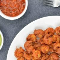 Shrimp Pakora · Shrimp marinated in kavya special spices, chickpea batter, comes with both mint and tamarind...