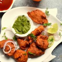 Fish Pakora · Fish marinted in kavya spices, chickpea batter and comes with both tamarind and mint sauce