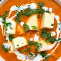Butter Paneer · Cottage cheese, Indian spices cooked with a hint of butter, and homemade tomato sauce.