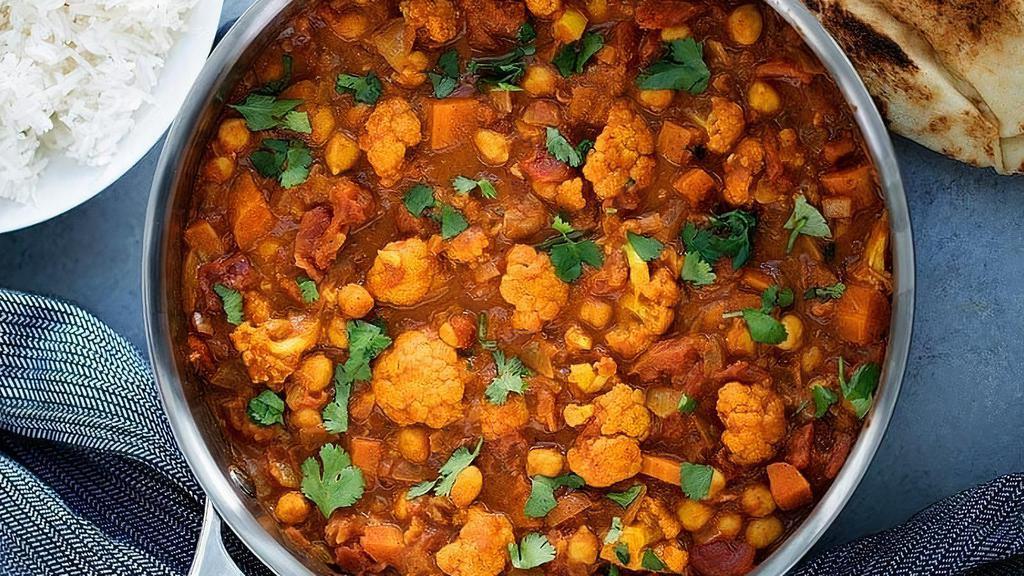 Veggie Tikka Masala · Sautéed mixed vegetable, Indian spices cooked with tikka masala sauce.