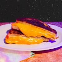 Grilled Cheese · Melted cheddar and american cheese, brioche bun.