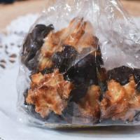 Chocolate-Dipped Coconut Macaroon Bag · A bag of our delicious chocolate dipped coconut macaroons!