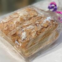 Almondettes - Mini (6 Half Sticks) · Our flaky almondettes are puff pastry with powdered sugar and sliced almonds. They simply me...