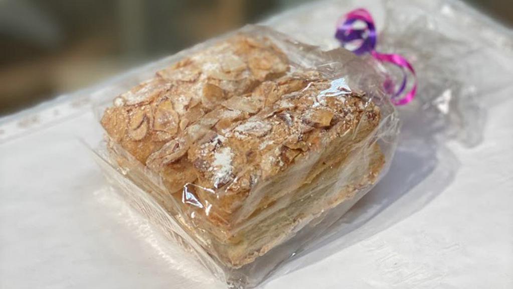 Almondettes - Mini (6 Half Sticks) · Our flaky almondettes are puff pastry with powdered sugar and sliced almonds. They simply melt in your mouth into deliciousness!