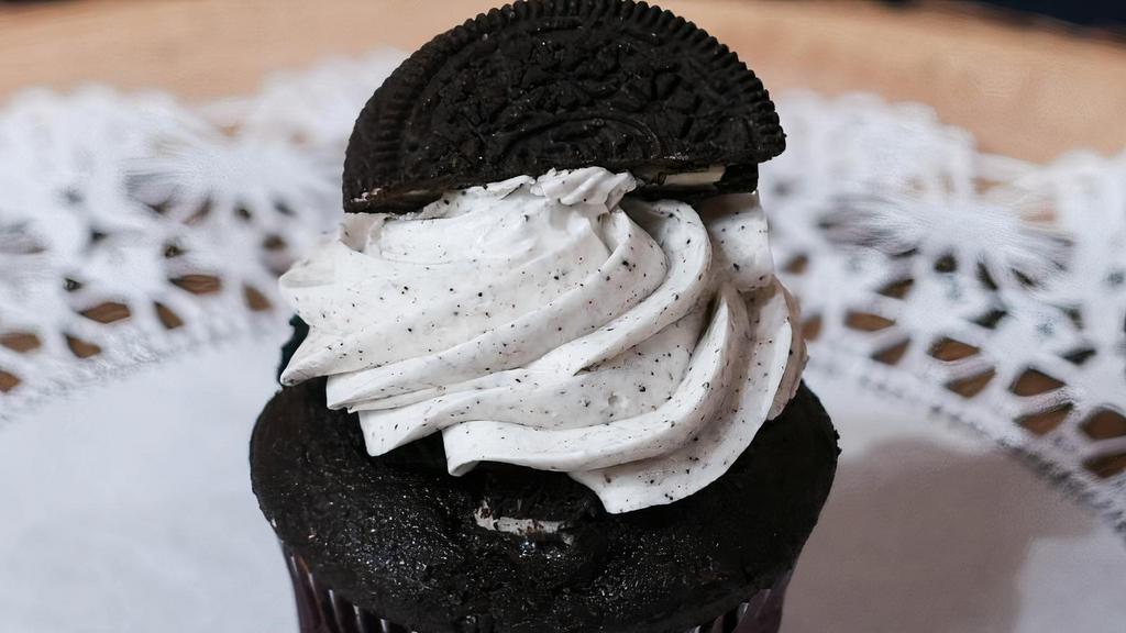 Cookies & Cream Cupcake · If you love cookies and cream ice cream, you will love this cupcake. The creamy frosting combined with the Oreo cookie is irresistible.