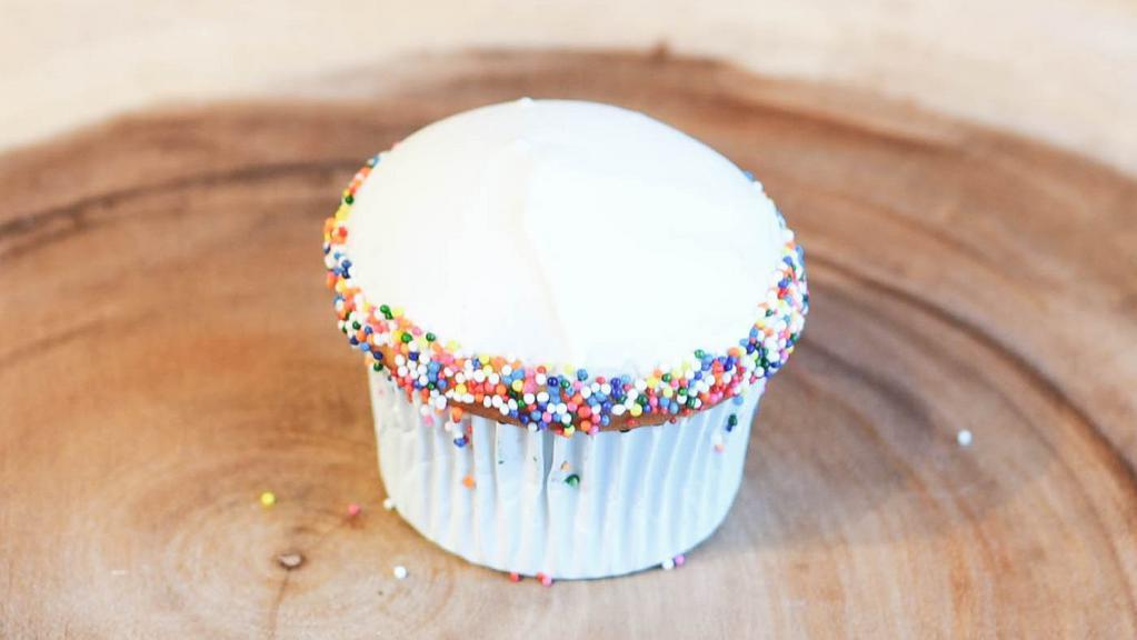 Vanilla Cupcake · Our vanilla cupcake is simple but delicious! It is a moist vanilla cake topped with vanilla buttercream and sprinkles.