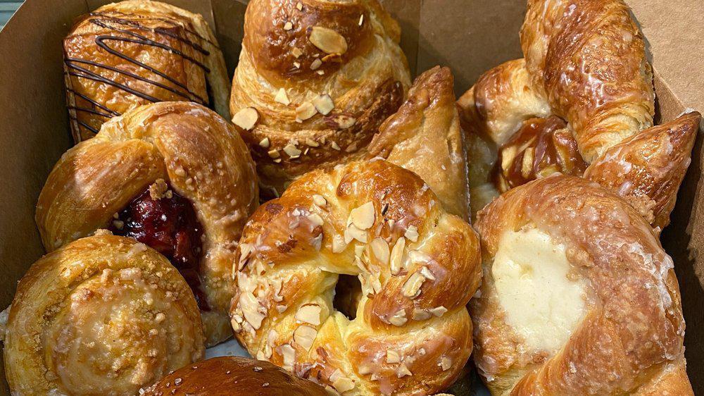 Large Assorted Pastry Box (10) · A random assortment of our delicious pastries (danish, croissants, scones, rolls, and more!). You are not guaranteed to recieve any specific item. Contains 10 Pastries.