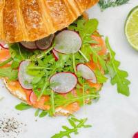 SMOKED SALMON CROISSANT SANDWICH · Ingredients: Cream cheese spread with herbs, radish, and aragula.
COMES WITH FRESH REGULAR C...