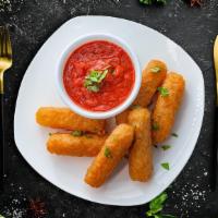 Mozzarella Cheese sticks · Perfect crunchy appetizer made of mozzarella cheese fingers crumbed and pan fried till golde...