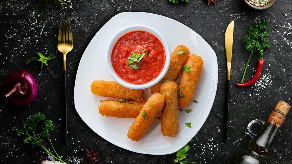 Mozzarella Cheese sticks · Perfect crunchy appetizer made of mozzarella cheese fingers crumbed and pan fried till golden and crisp