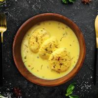 Ras Malai Delight  · Cottage cheese patties flattened and soaked in  milk with whole spices