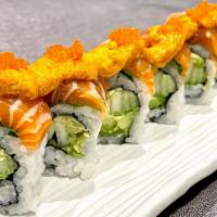Uni Deluxe Roll · Cucumber and Avocado inside, top with Sea urchin, Salmon belly, tobiko and shiso leave
