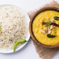 Dal Makhani · Creamy lentil stew prepared with garlic, tomatoes, and fresh spices.