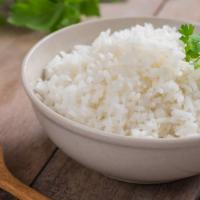Basmati Rice · Steamed white basmati rice.