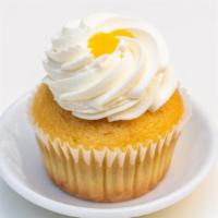 Passion Fruit · Vanilla cake with passion fruit filling and whipped cream frosting.