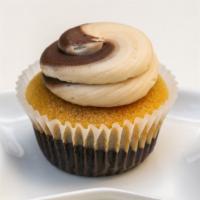 Duo Chocolate & Vanilla · Infused chocolate and vanilla cake topped with chocolate and vanilla buttercream frosting. A...
