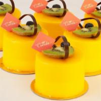 Bamboo (Mango & Passion Fruit Mousse) · Light and fresh, this mango passion fruit and white chocolate mousse pastry is made with alm...