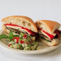 Grilled Portobello Mushroom Sandwich · With roasted red pepper, Mozzarella cheese, olive oil / balsamic vinegar, basil. Potato on t...