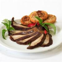 Grilled Portobello Mushroom · With lettuce, crouton, olive oil and balsamic vinegar.