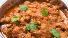 Lamb Madras Curry · Marinated lamb in a spicy curry sauce.