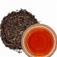 Thai Black Tea · A light-bodied black tea blend with a subtle spiced aroma and smooth warm finish.