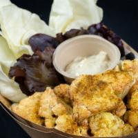 Fried Cauliflower · Fried in soybean oil. Comes with side cabbage and miso  ranch. Pick one seasoning of your ch...