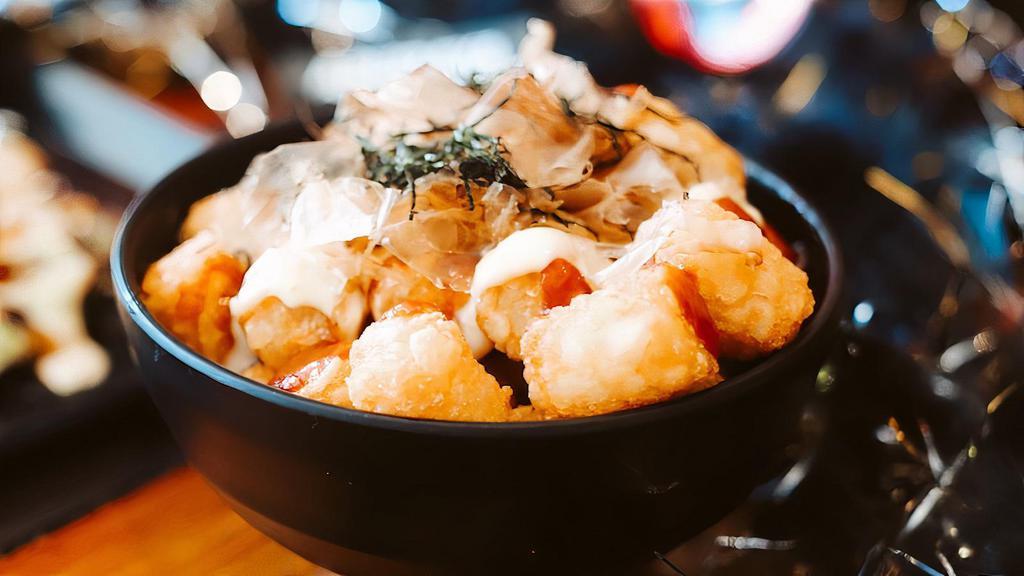 Aburaya Tater tots · Tater tots with Aburaya BBQ, orange aioli, bonito flakes and shredded seaweed