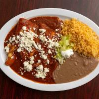 Chicken Enchiladas · WITH RED SAUSE OR GREEN SAUSE, lettuce, queso fresco, and sour cream.