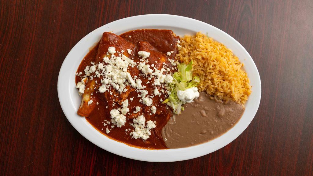 Chicken Enchiladas · WITH RED SAUSE OR GREEN SAUSE, lettuce, queso fresco, and sour cream.