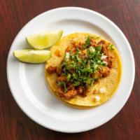 Tacos · Choice of meat, salsa, onion, and cilantro.