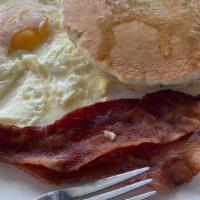 Pancake Combo · Two pancakes, sausage or bacon, Two eggs any Style