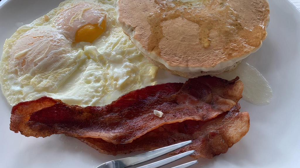 Pancake Combo · Two pancakes, sausage or bacon, Two eggs any Style
