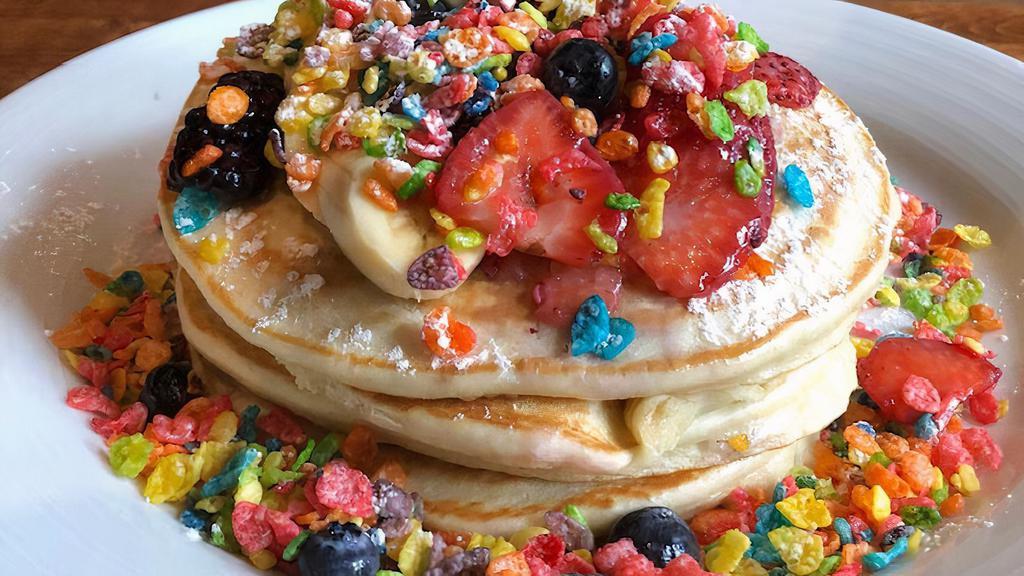 5. Cereal Pancakes · Fruity pebbles, corn pops, infused pancakes with cereal milk whip cream.
