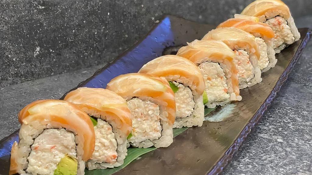 49er Roll · Imitation crab, avocado topped with salmon and thinly sliced lemon.