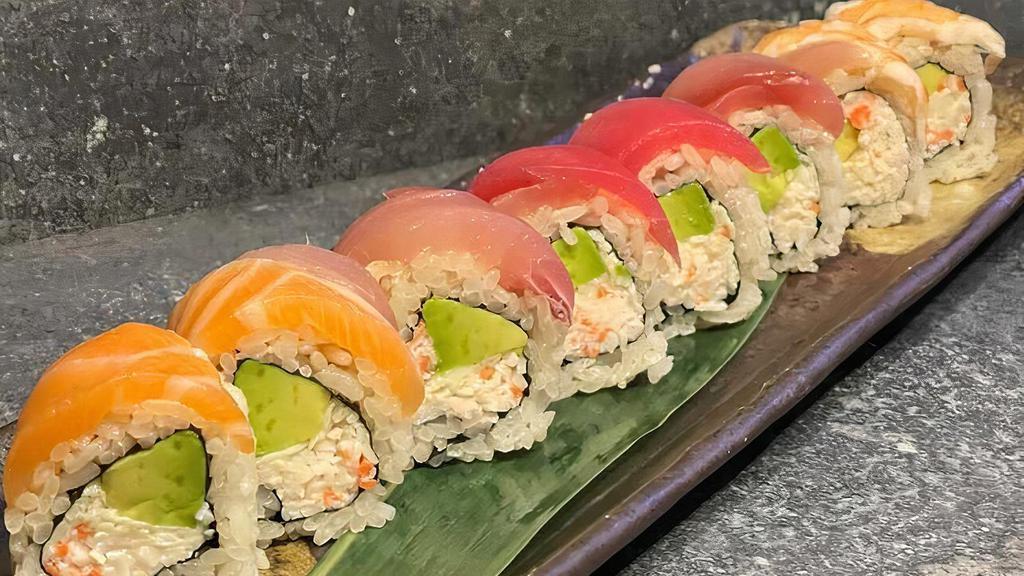 Pride Roll · Imitation crab, avocado topped with assorted fish.