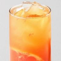 Grapefruit Jasmine Tea · Fragrant jasmine green tea mixed with freshly squeezed grapefruit juice and served with grap...