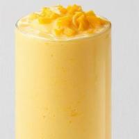 Mango Frostie · Fresh mango perfectly ice-blended with dried mango and our signature housemilk and served wi...