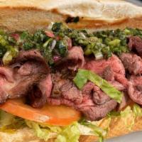 Chimichurri Tri Tip · Grilled tri tip, shredded romaine, tomatoes, house mayo, and chimichurri sauce on a French t...