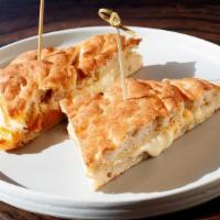 Gourmet Melt · Brie, provolone, smoked gouda, and pecorino melted between toasted focaccia bread.