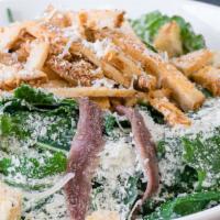 Kale Chicken Caesar Salad · Organic baby kale, grilled chicken, parmesan cheese, croutons and anchovies with Caesar dres...