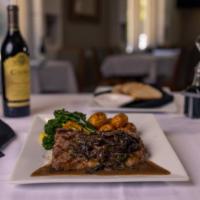 Bistecca Alla Granducato · Grilled New York steak, mixed mushrooms, rosemary, Chianti