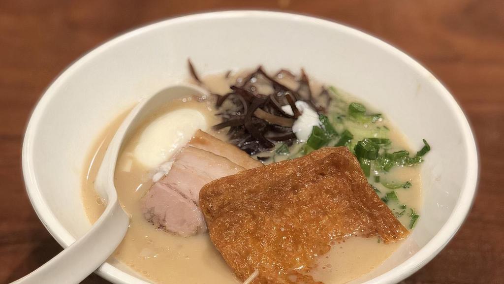 Shiromaru Classic Ramen · The original tonkotsu pork broth with our signature dashi, thin noodles topped with pork belly chashu, bean sprouts, kikurage mushrooms and scallions. Suggested toppings: Ajitama, nori, red ginger, sesame seeds, garlic purée.