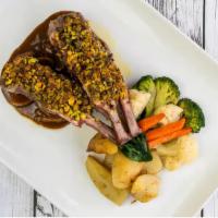Pistachio Crusted Lamb Chops · Gluten free. Aged fig balsamic, roasted potato, vegetables. Served raw or undercooked, or co...