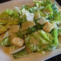 Caesar Salad · Romaine, Caesar dressing, shaved Parmesan and house-made croutons