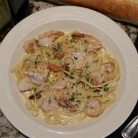 Seafood Fettuccine · Scallops and prawns in our seafood garlic cream sauce.
