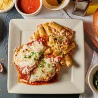 Chicken Parmesan · Baked in our pear tomato sauce with Mozzarella and served with a side of Rigatoni Bolognese.