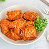 Buffalo Fried Chicken Thigh · Crispy & crunchy fried chicken thighs dipped in spicy buffalo sauce.